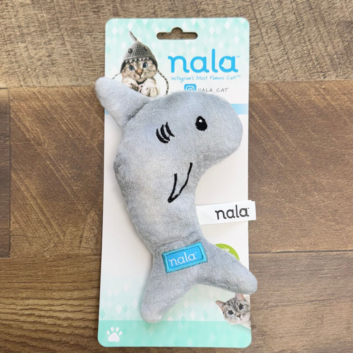 Nala Simon the Shark gray plush cat toy on its packaging card