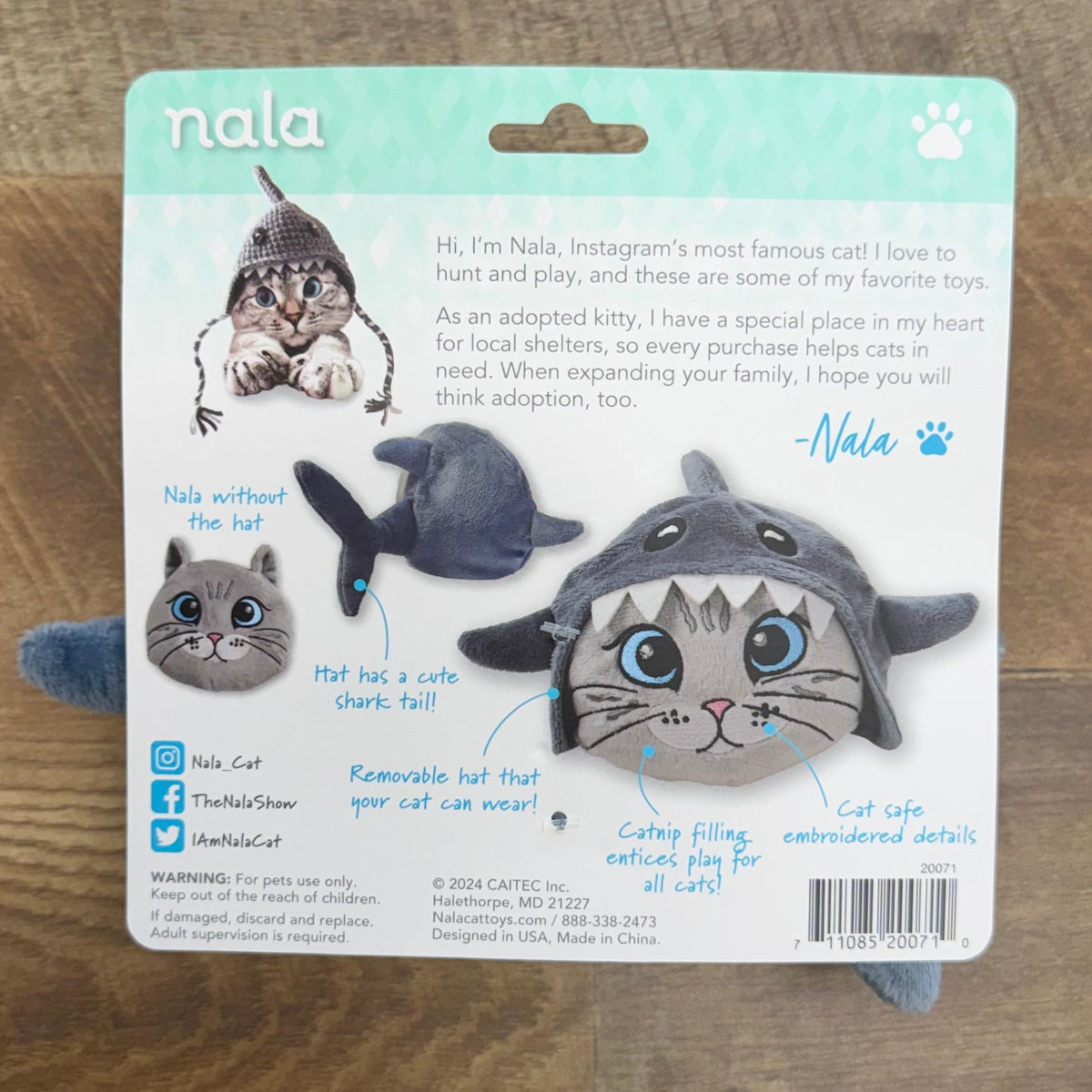 Back of the Nala Catnip in Shark Hat packaging showing the removable shark hat and catnip filling