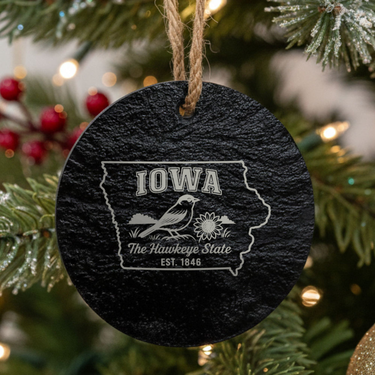 Round slate Christmas ornament laser engraved with an Iowa design of an American goldfinch and a sunflower