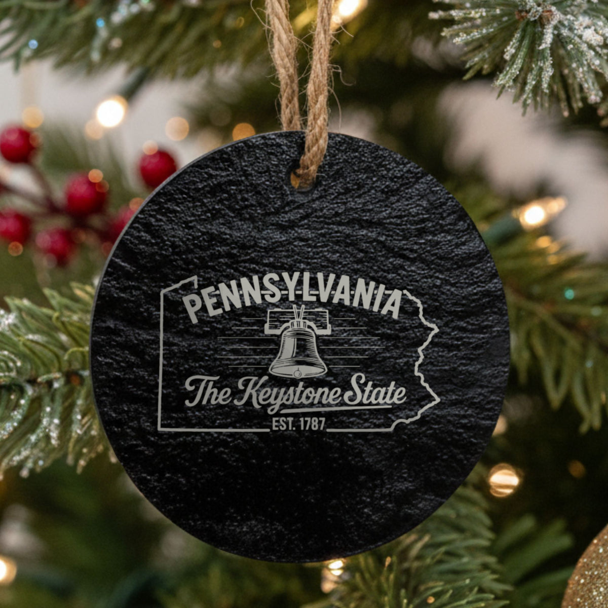 Round slate Christmas ornament laser engraved with a Pennsylvania design of the Liberty Bell