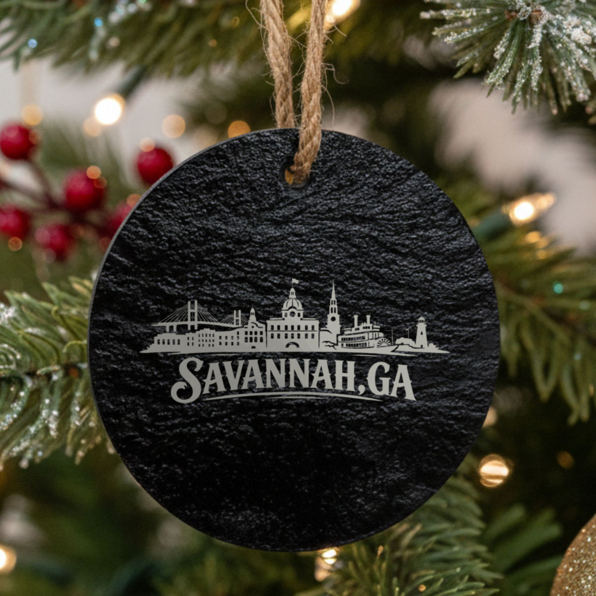Savannah, Georgia skyline engraved on a round slate Christmas ornament