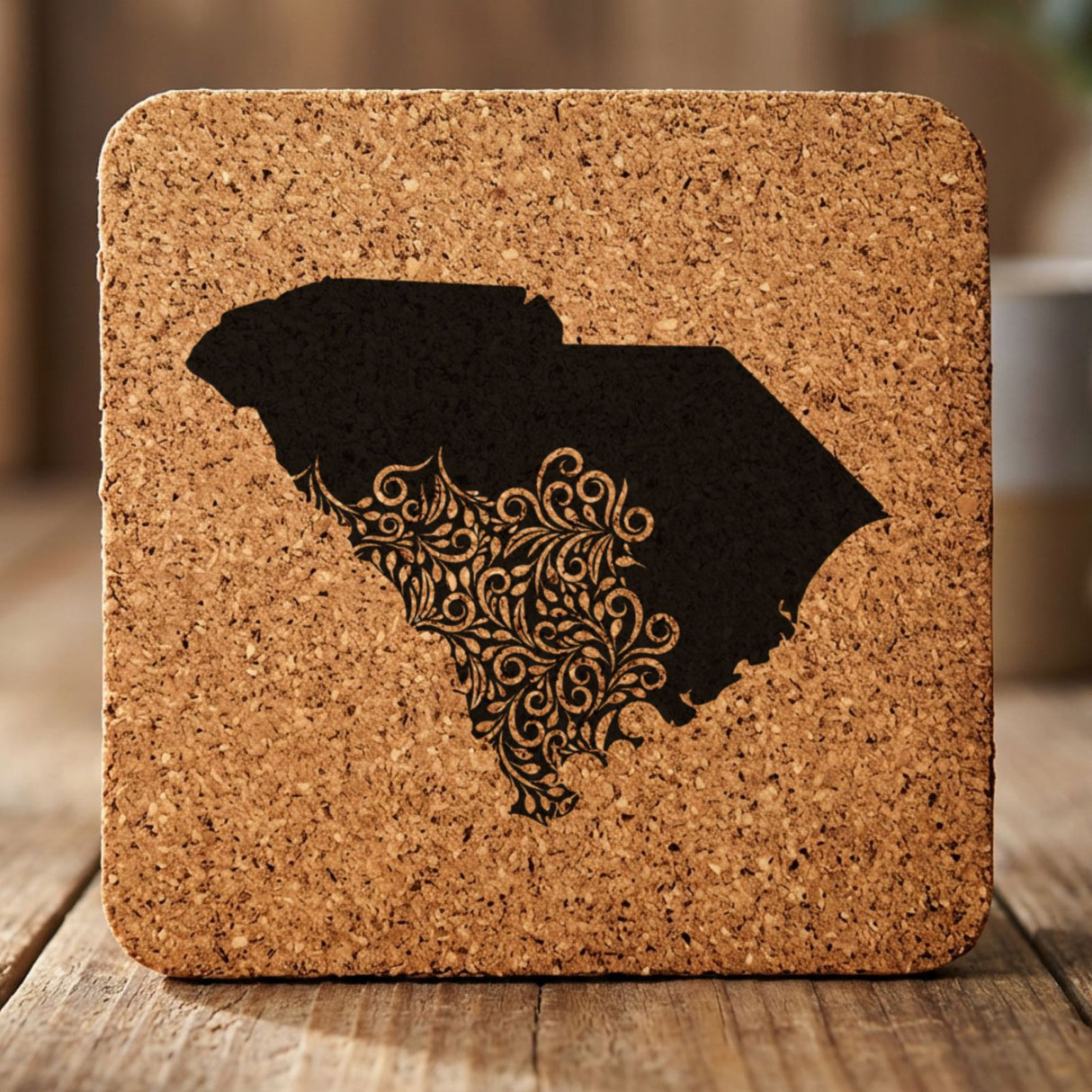 South Carolina square cork coaster engraved with the state shape in ornate floral scrollwork