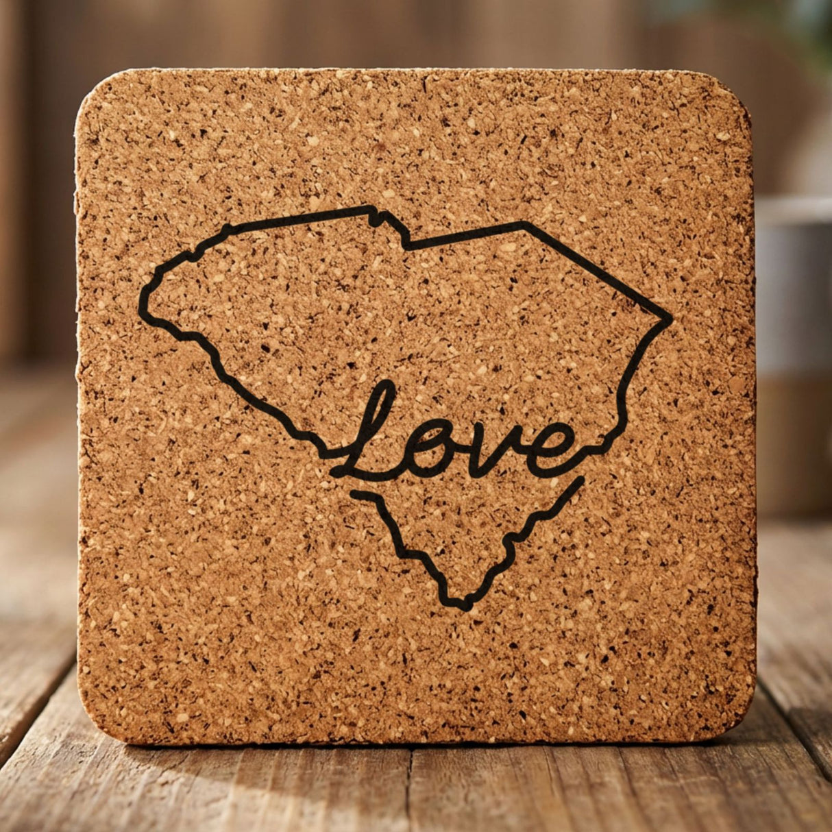 South Carolina square cork coaster engraved with a hand-drawn state outline and love in cursive