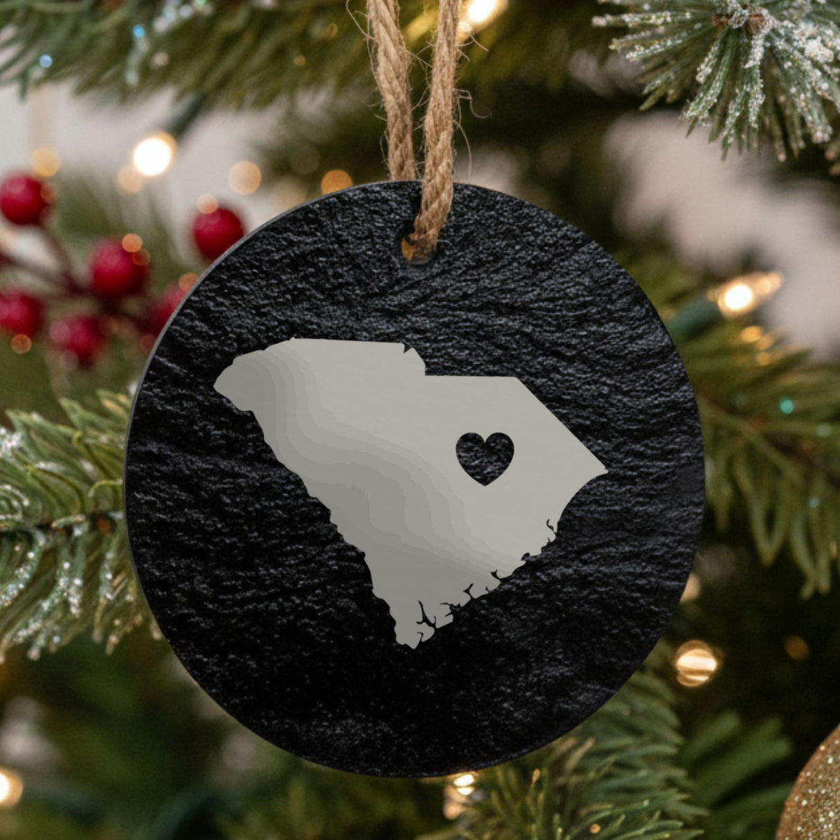 South Carolina round slate Christmas ornament engraved with the state shape and a heart