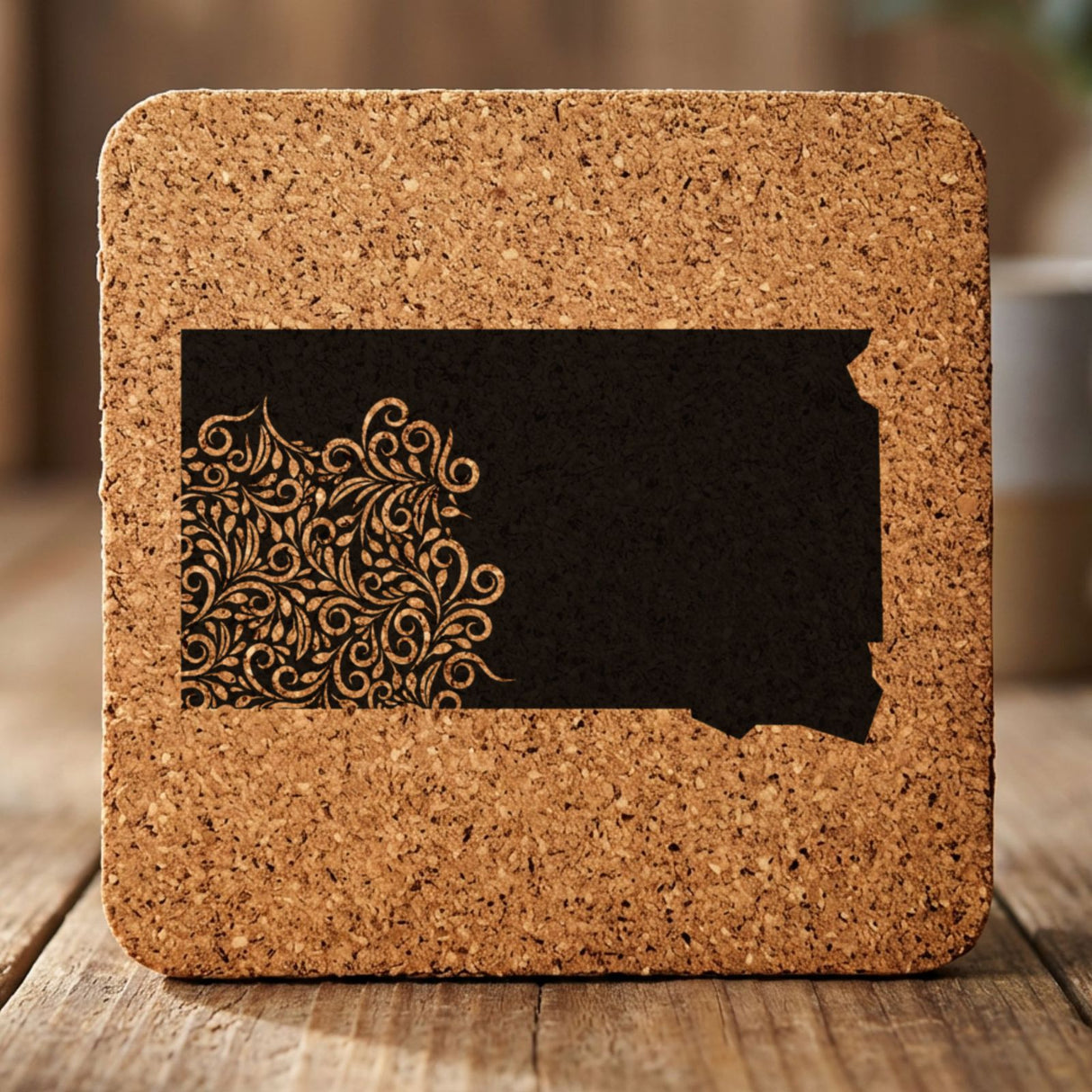 South Dakota square cork coaster engraved with the state shape in ornate floral scrollwork
