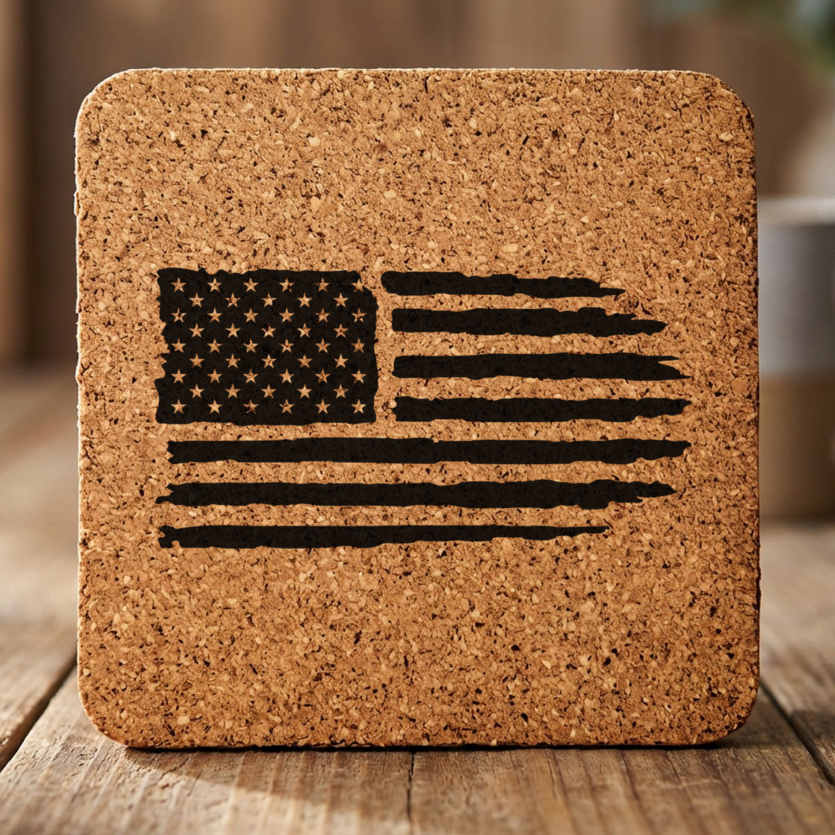 Square cork coaster laser engraved with an American flag, distressed design