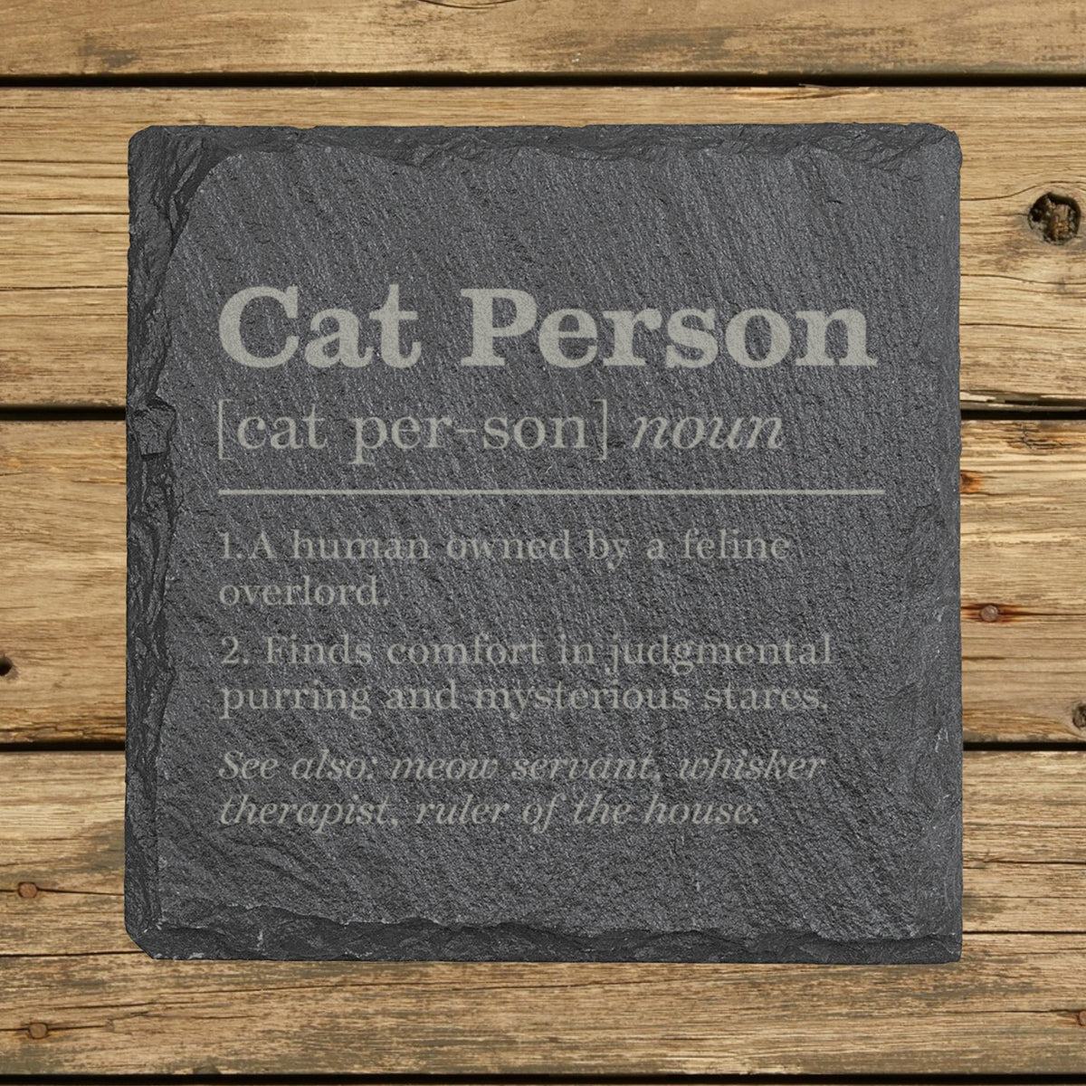 Square slate coaster laser engraved with the Cat Person definition