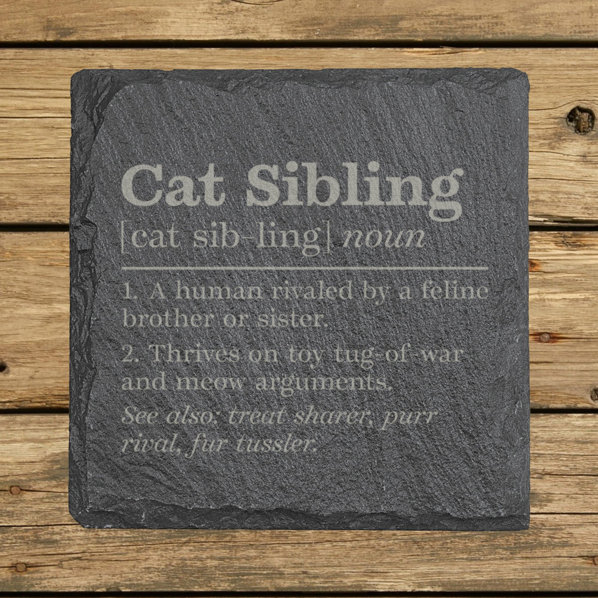 Square slate coaster laser engraved with the Cat Sibling definition
