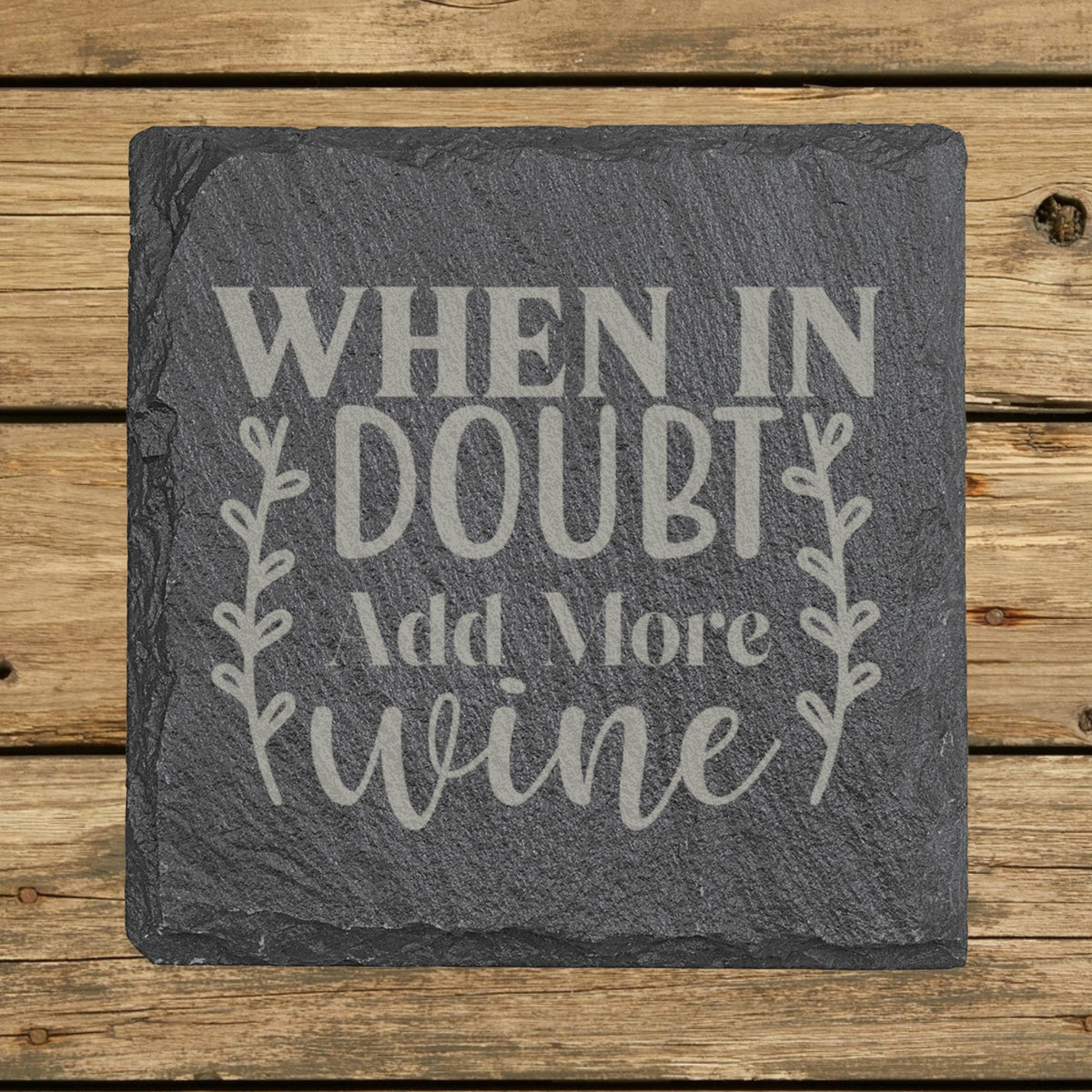 Square slate coaster laser engraved with "When in Doubt, Add More Wine", wreath design
