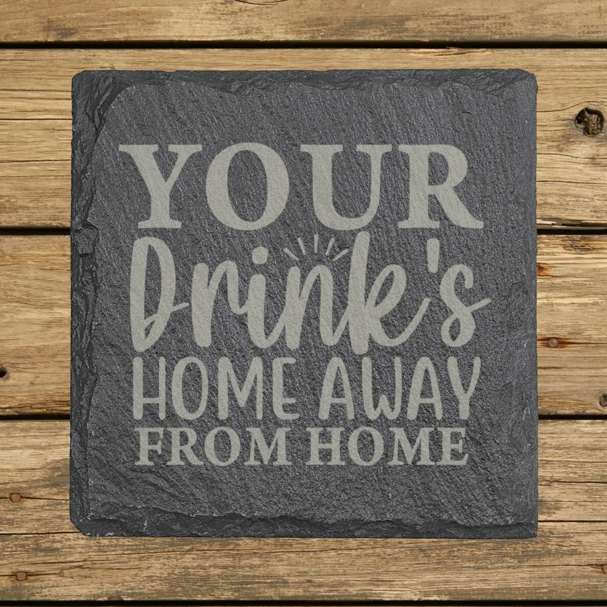 Square slate coaster laser engraved with "Your Drink's Home Away From Home"