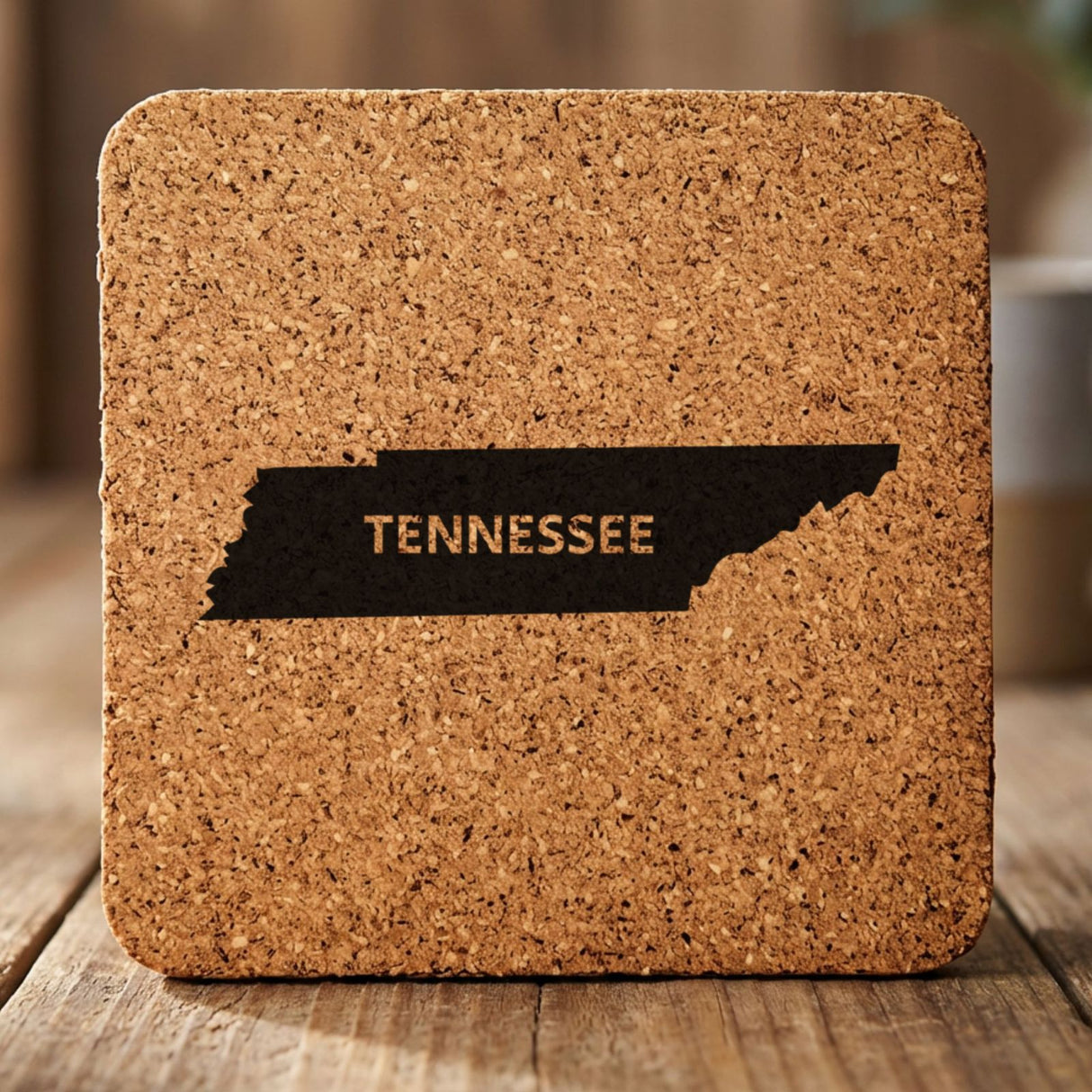 Tennessee square cork coaster engraved with the state shape and TENNESSEE in bold lettering
