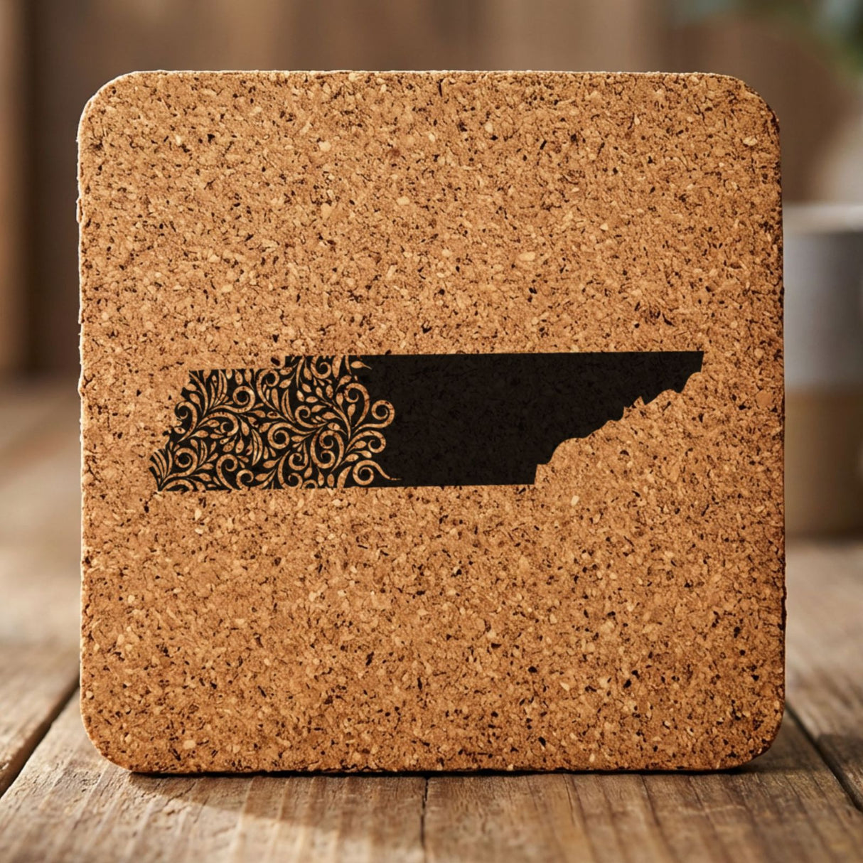 Tennessee square cork coaster engraved with the state shape in ornate floral scrollwork