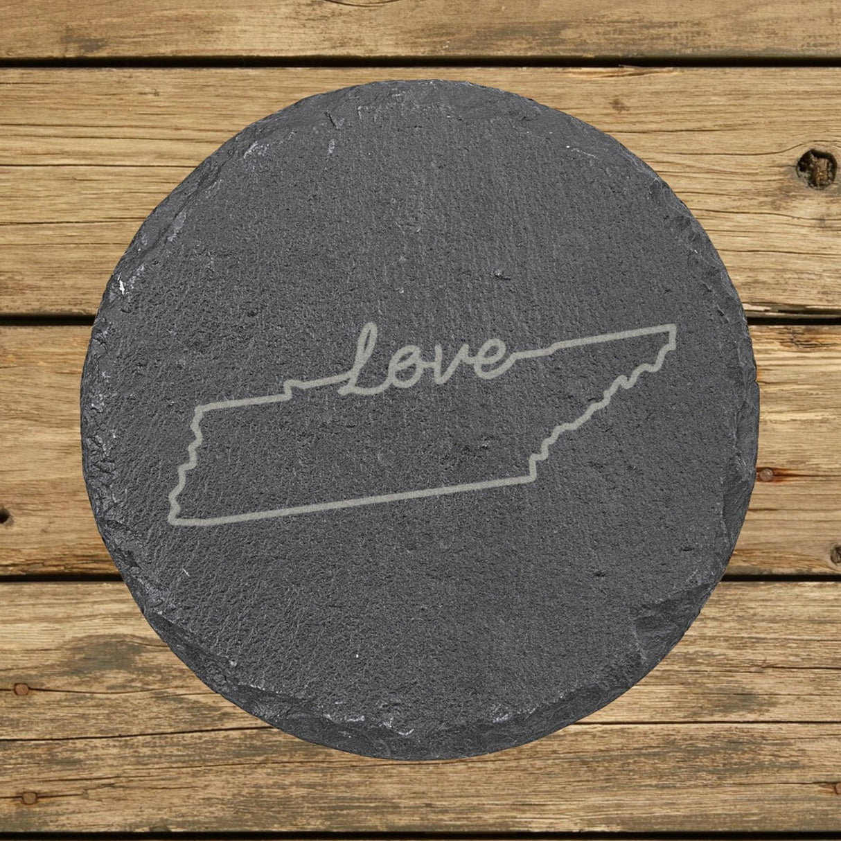 Tennessee round slate coaster engraved with a hand-drawn state outline and love in cursive