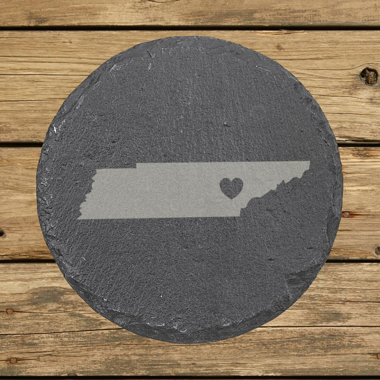 Tennessee round slate coaster engraved with the state shape and a heart