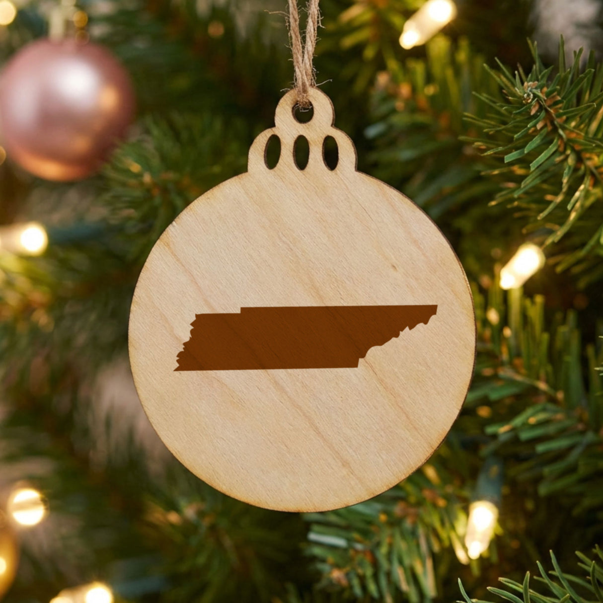 Tennessee round wood Christmas ornament with the full state shape engraved