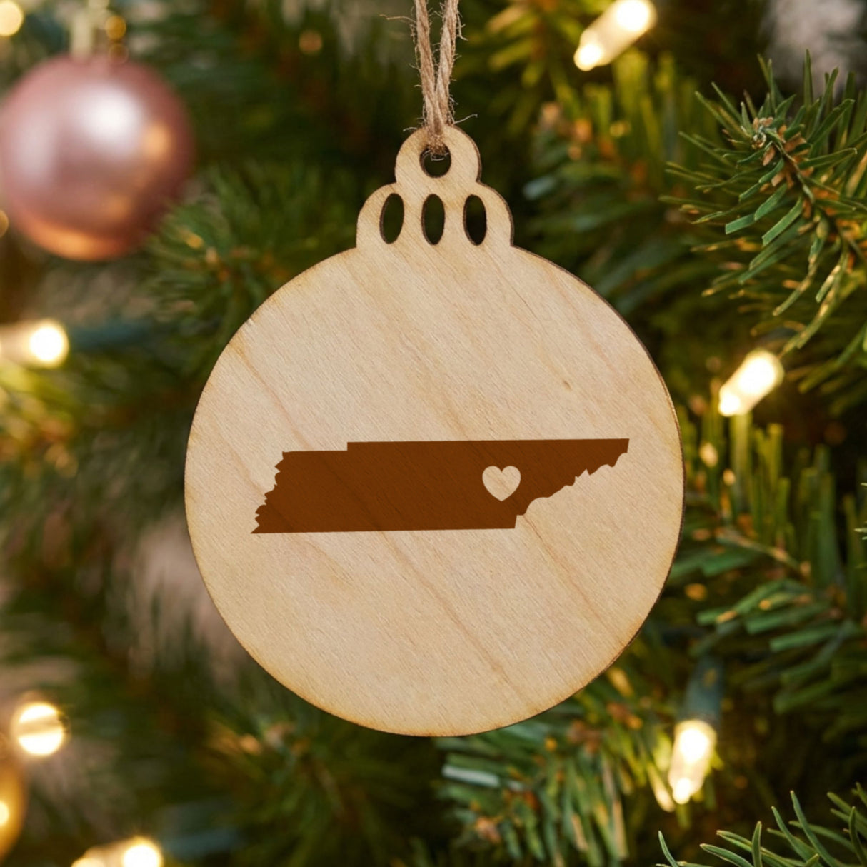 Tennessee round wood Christmas ornament engraved with the state shape and a heart