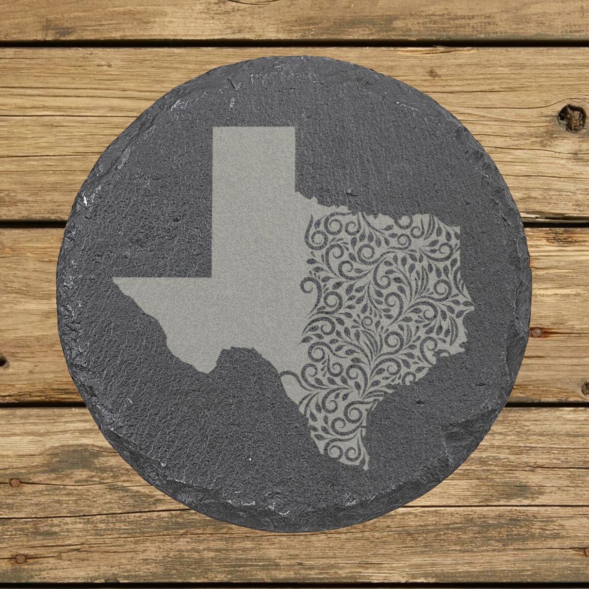 Texas round slate coaster engraved with the state shape in ornate floral scrollwork
