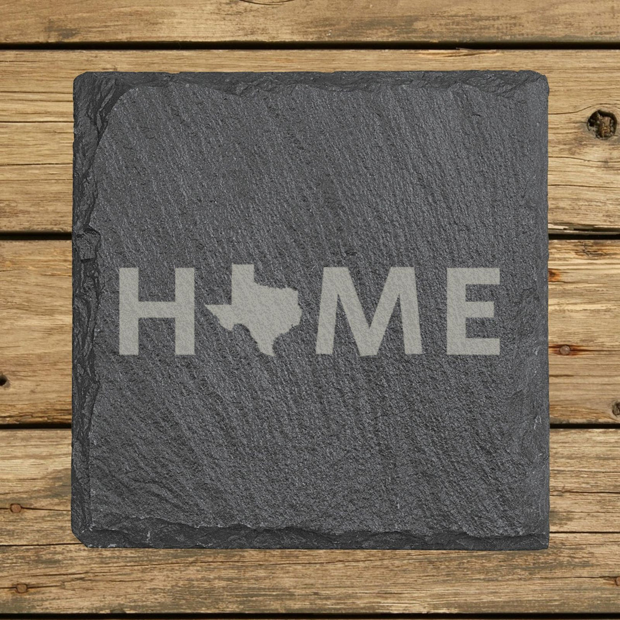 Texas square slate coaster engraved with HOME using the state outline as the letter O