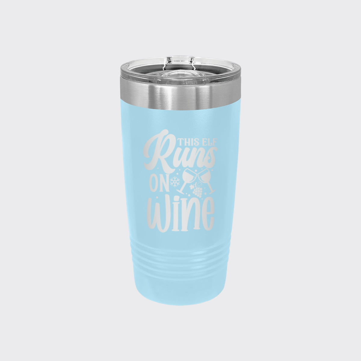 Light Blue 20 oz tumbler laser engraved with "This Elf Runs on Wine"