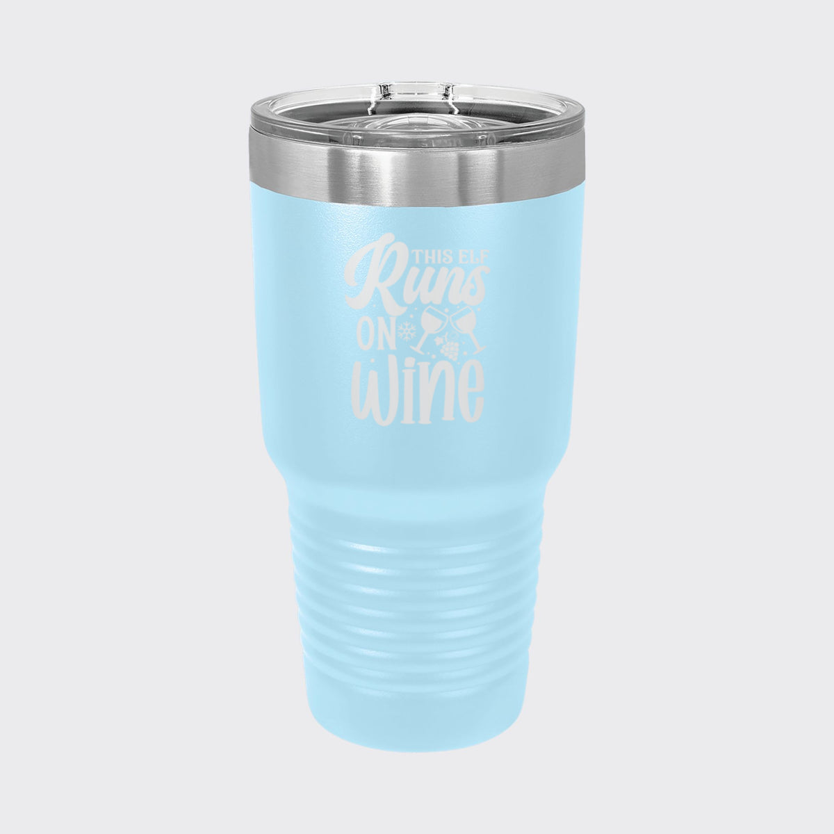 Light Blue 30 oz tumbler laser engraved with "This Elf Runs on Wine"
