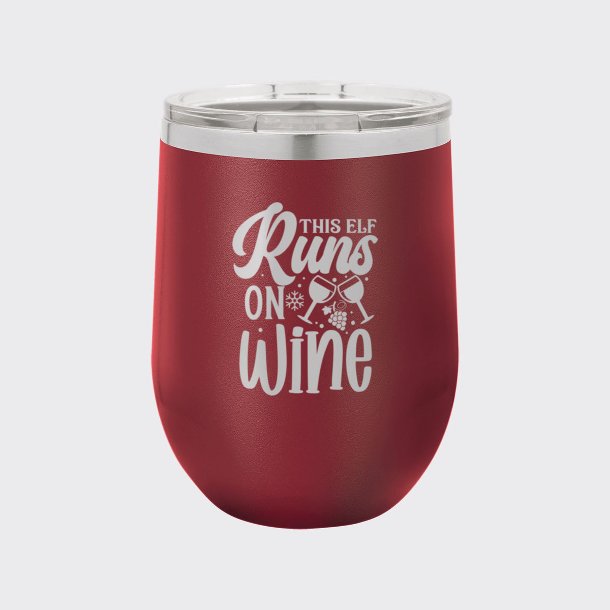 Maroon 12 oz stemless wine tumbler laser engraved with "This Elf Runs on Wine"