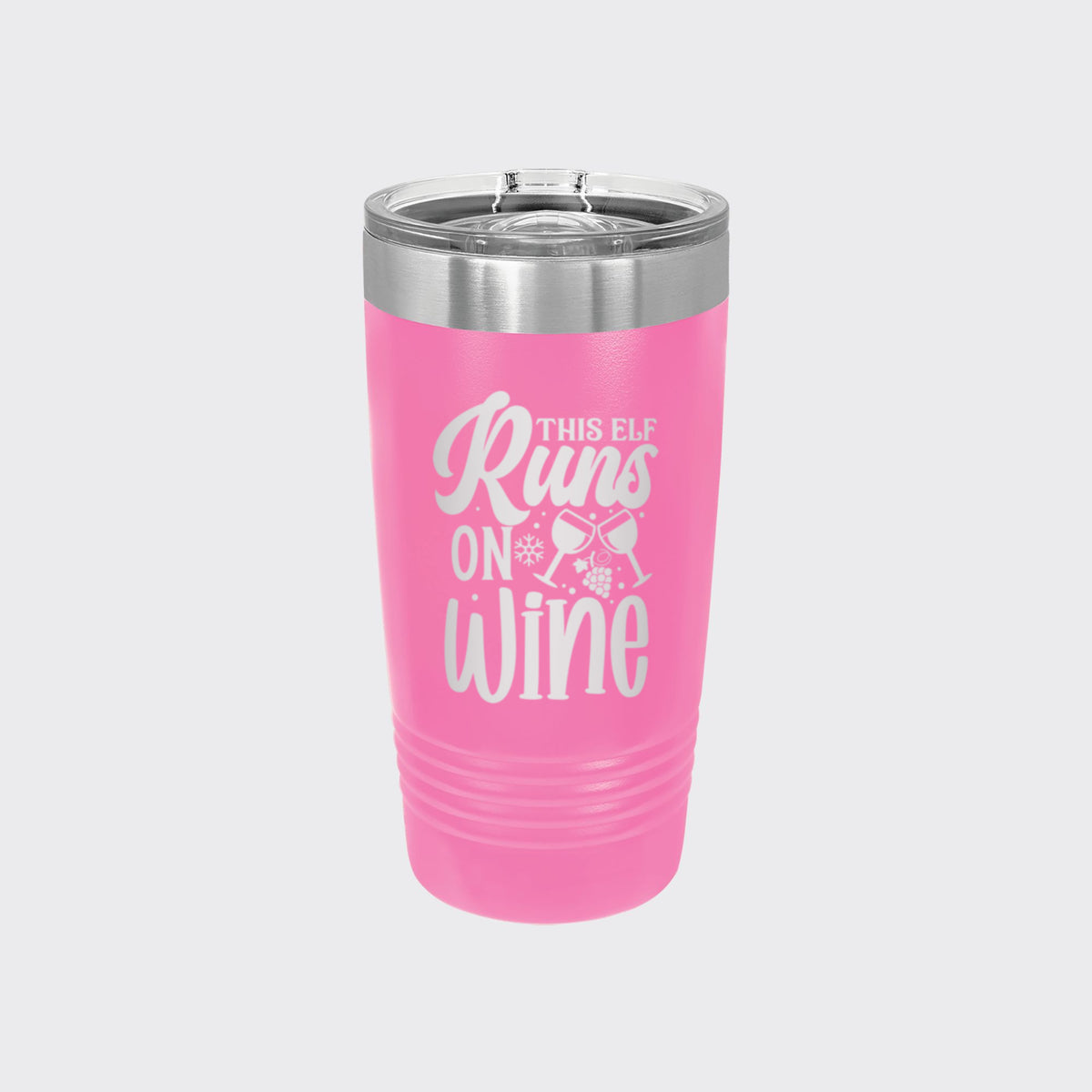 Pink 20 oz tumbler laser engraved with "This Elf Runs on Wine"