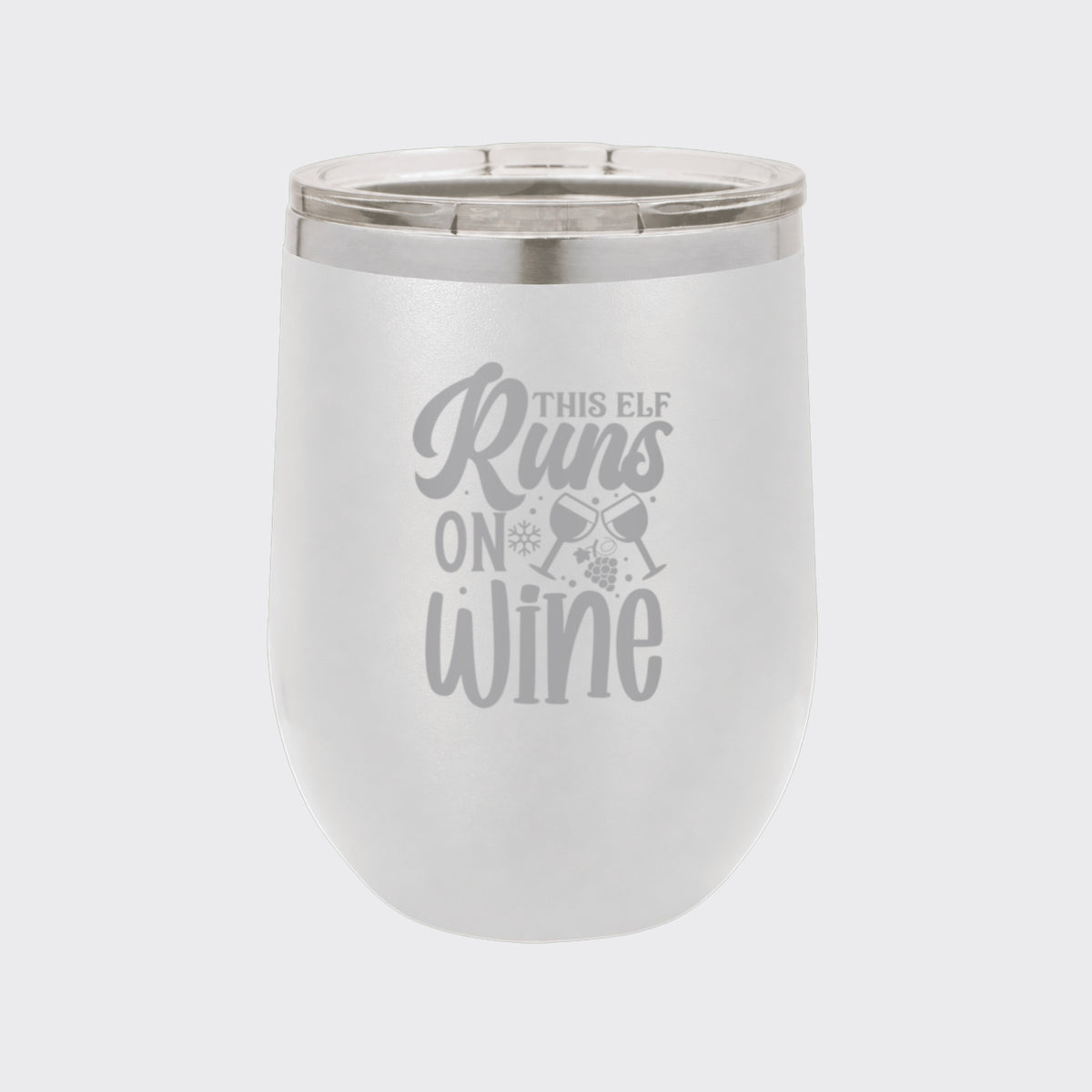 White 12 oz stemless wine tumbler laser engraved with "This Elf Runs on Wine"