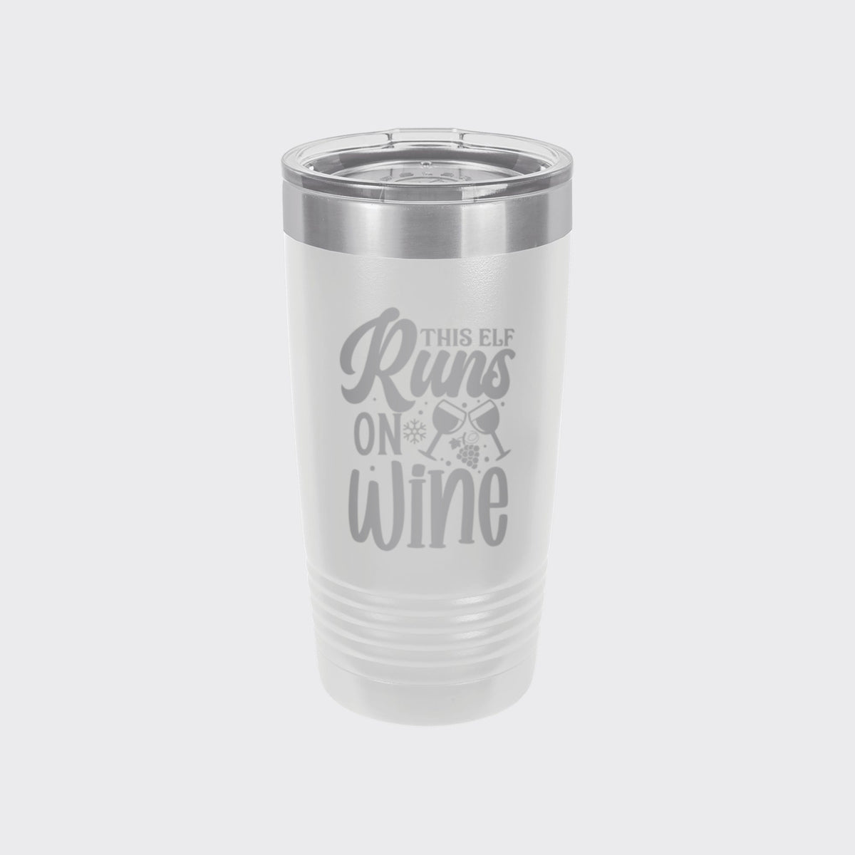 White 20 oz tumbler laser engraved with "This Elf Runs on Wine"