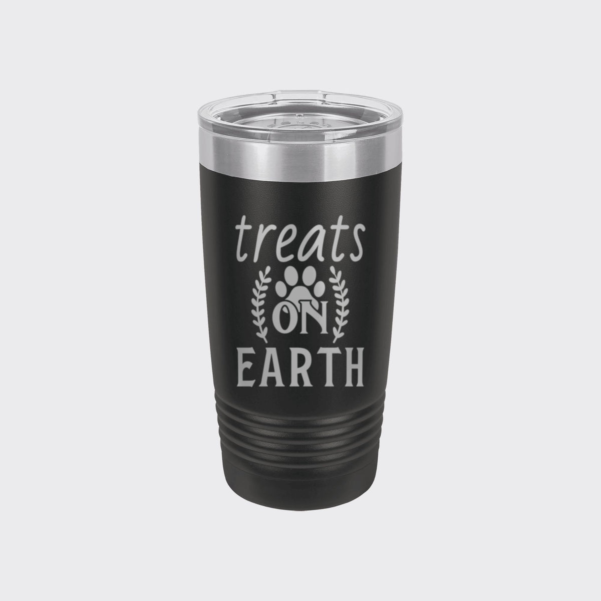 Black 20 oz tumbler laser engraved with "Treats on Earth"
