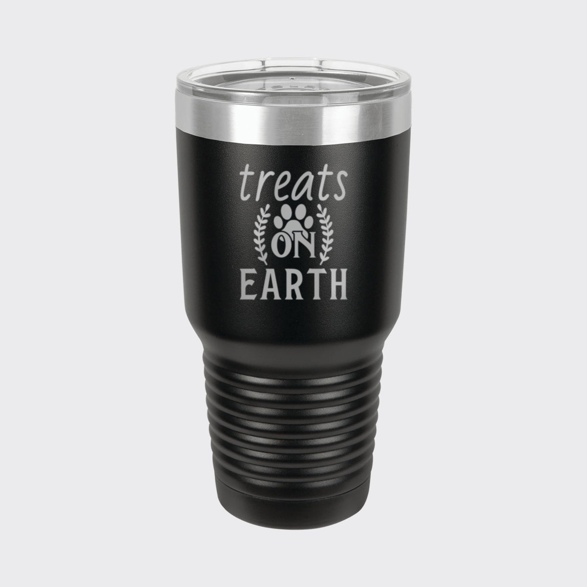 Black 30 oz tumbler laser engraved with "Treats on Earth"