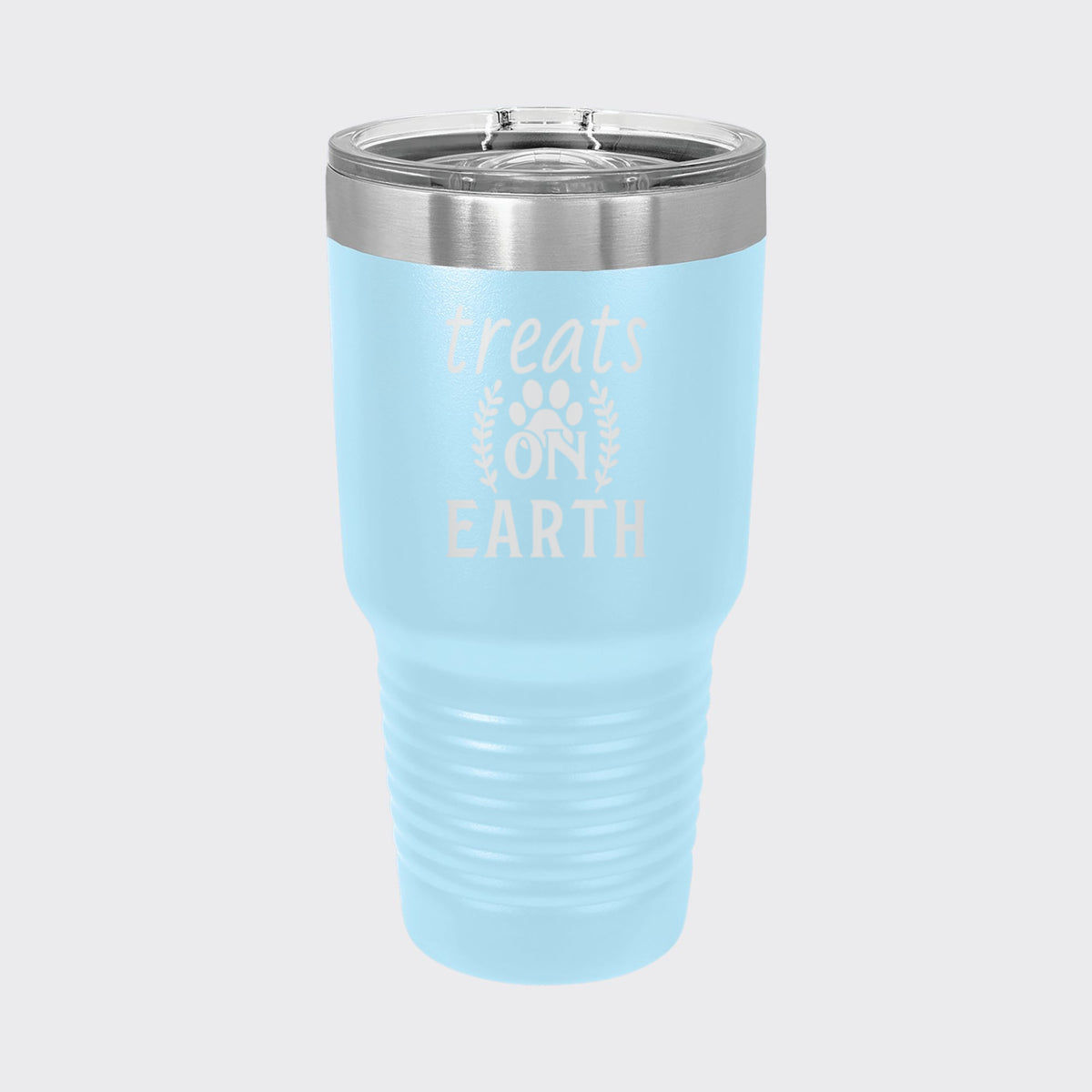 Light Blue 30 oz tumbler laser engraved with "Treats on Earth"