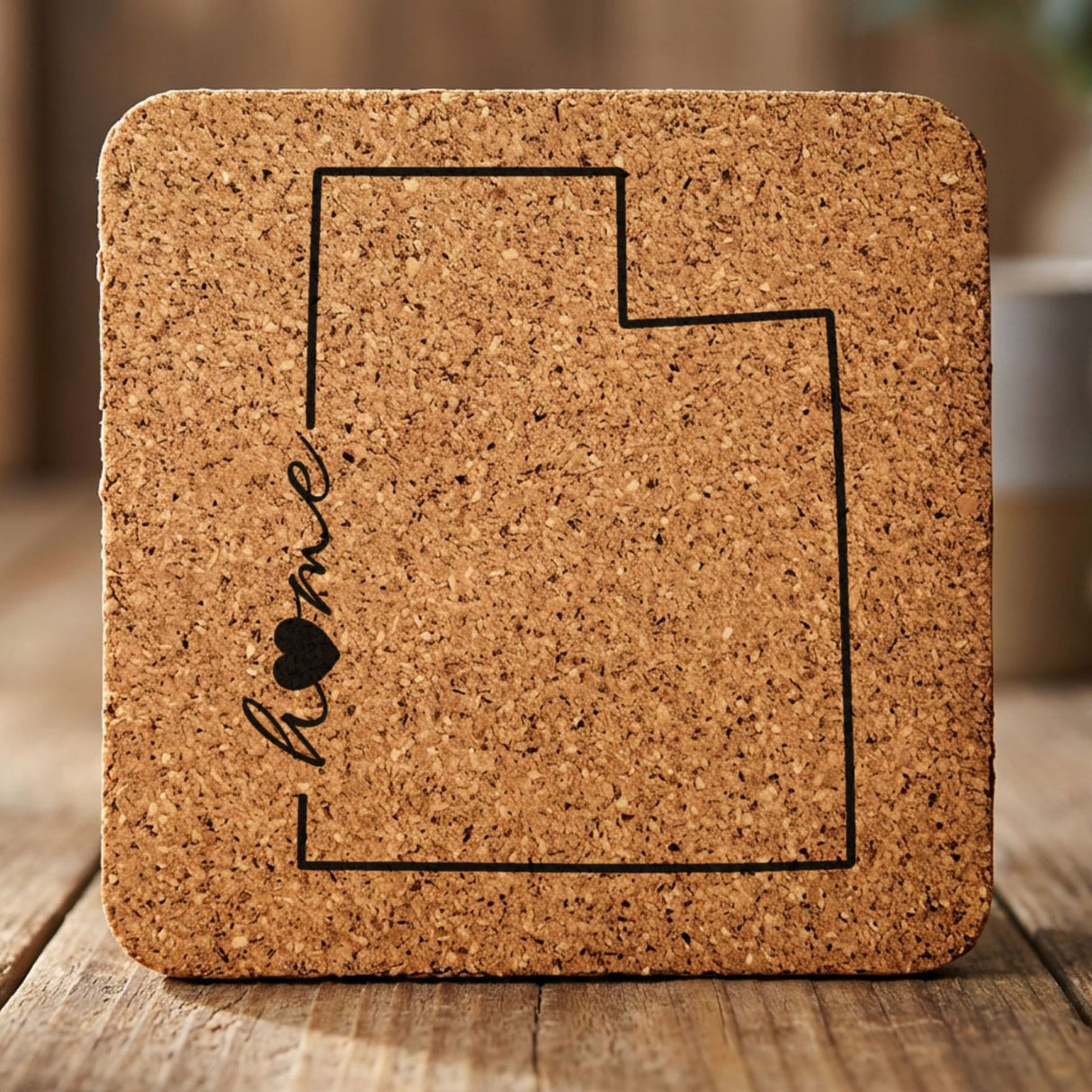 Utah square cork coaster engraved with the state outline and home in script with a heart
