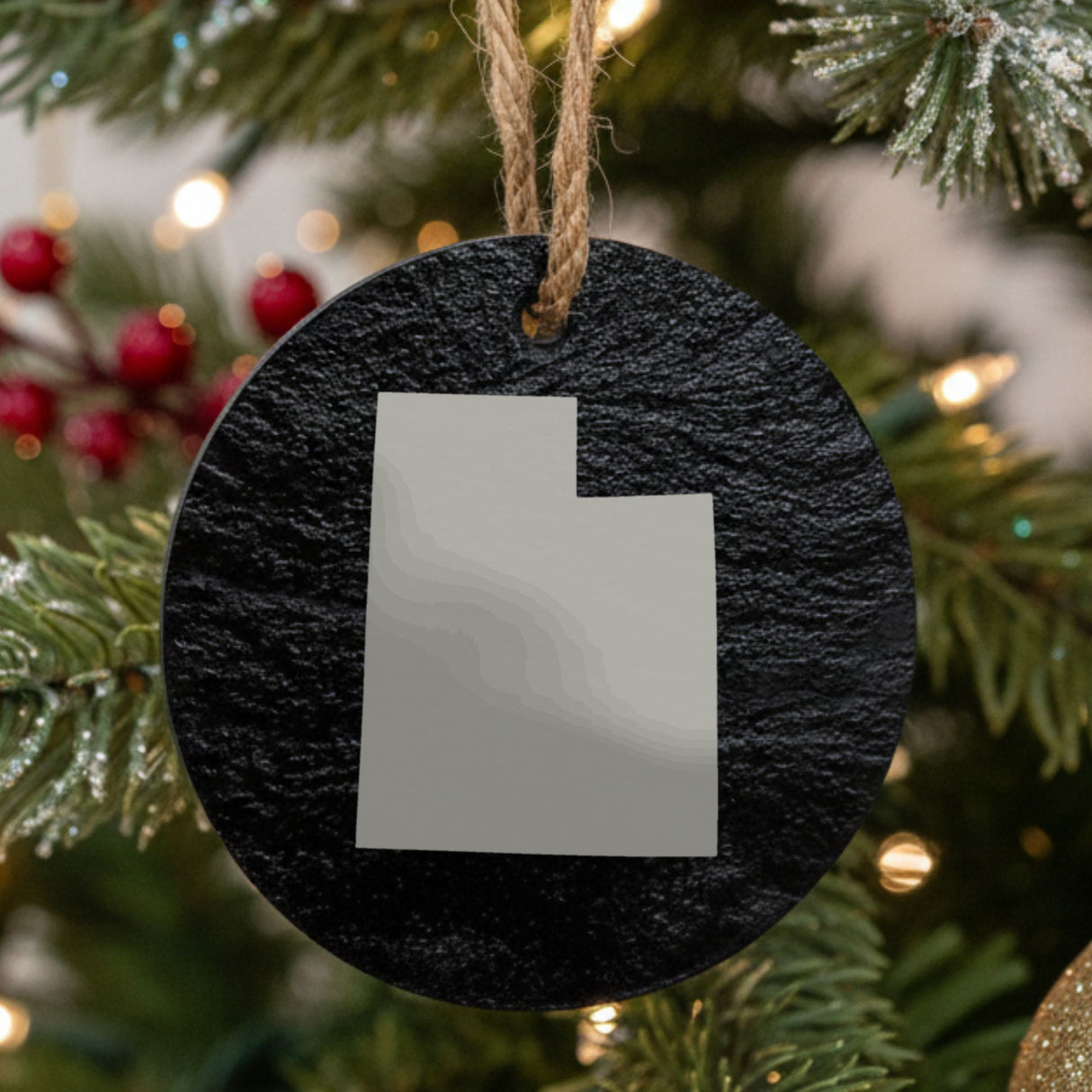 Utah round slate Christmas ornament with the full state shape engraved