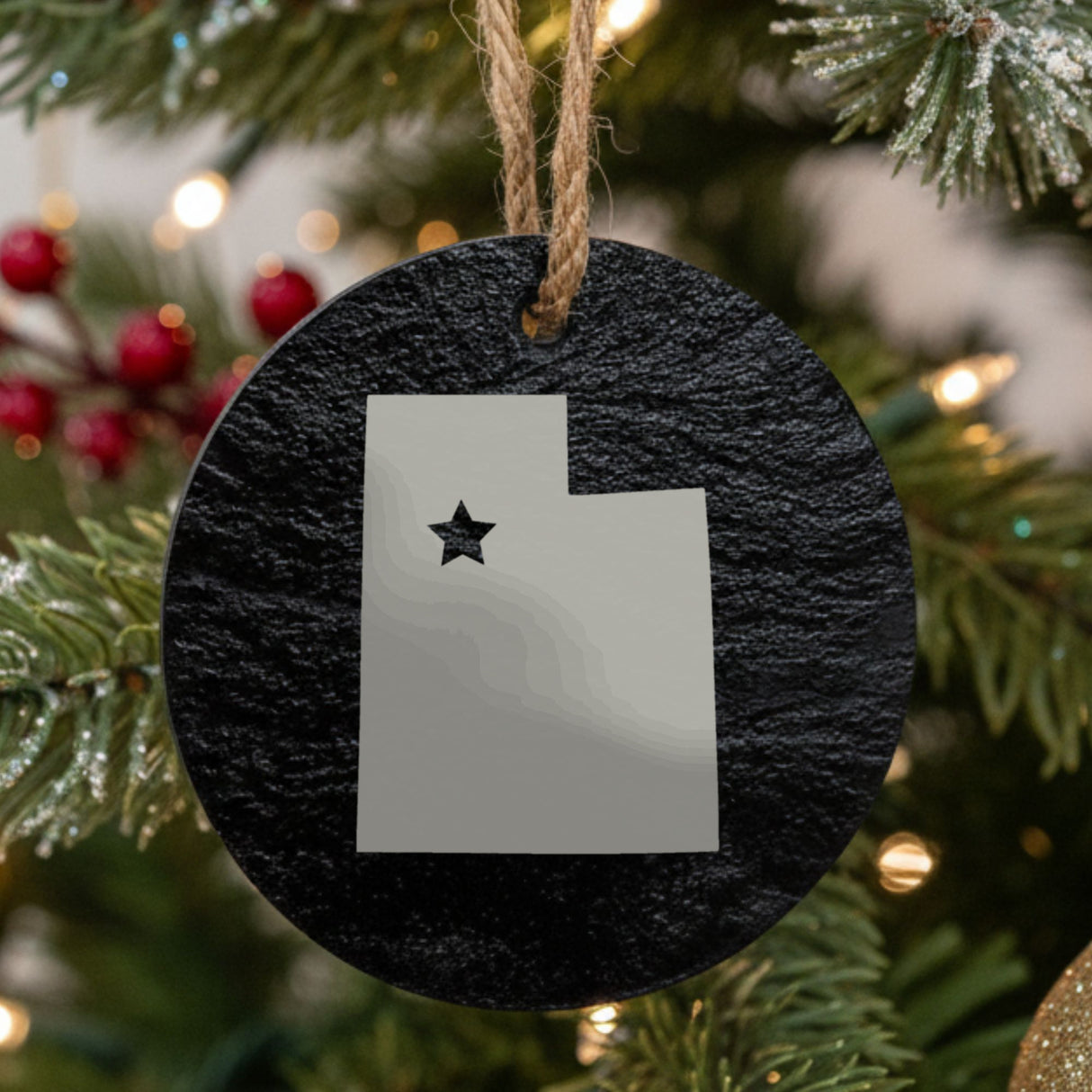 Utah round slate Christmas ornament engraved with the state shape and a star