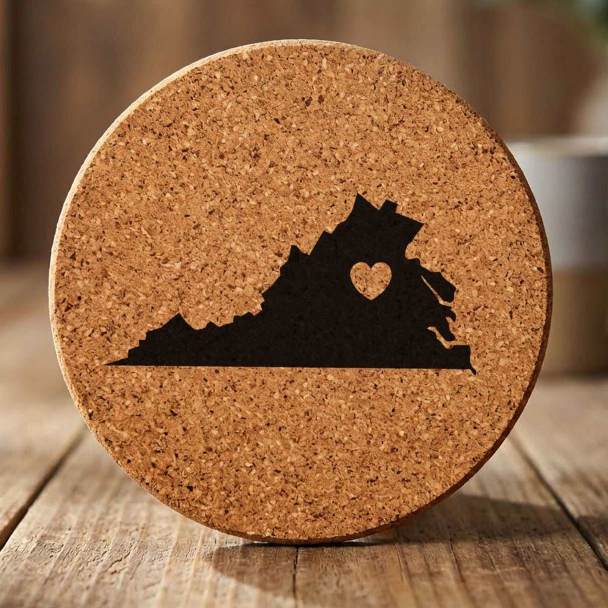 Virginia round cork coaster engraved with the state shape and a heart