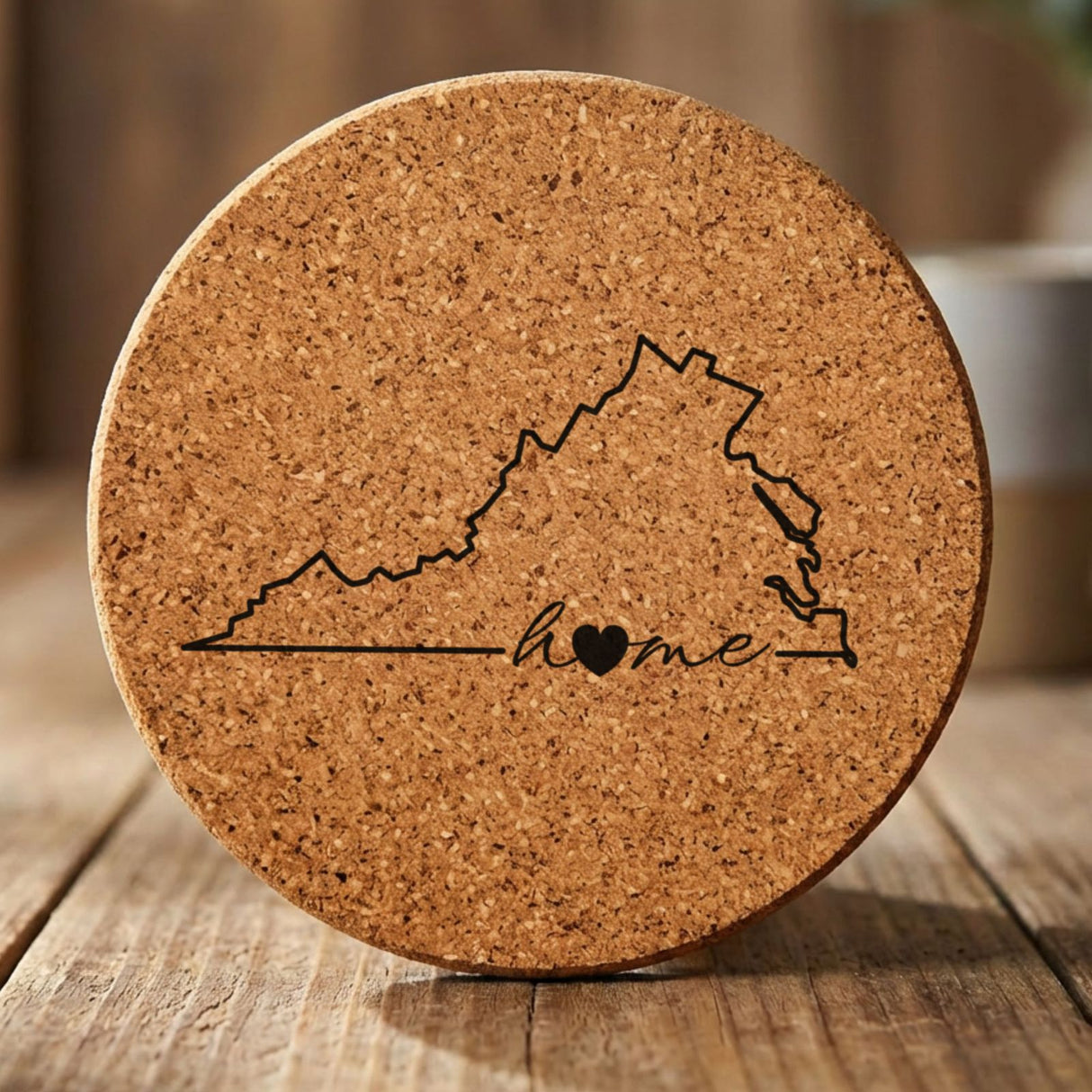 Virginia round cork coaster engraved with the state outline and home in script with a heart