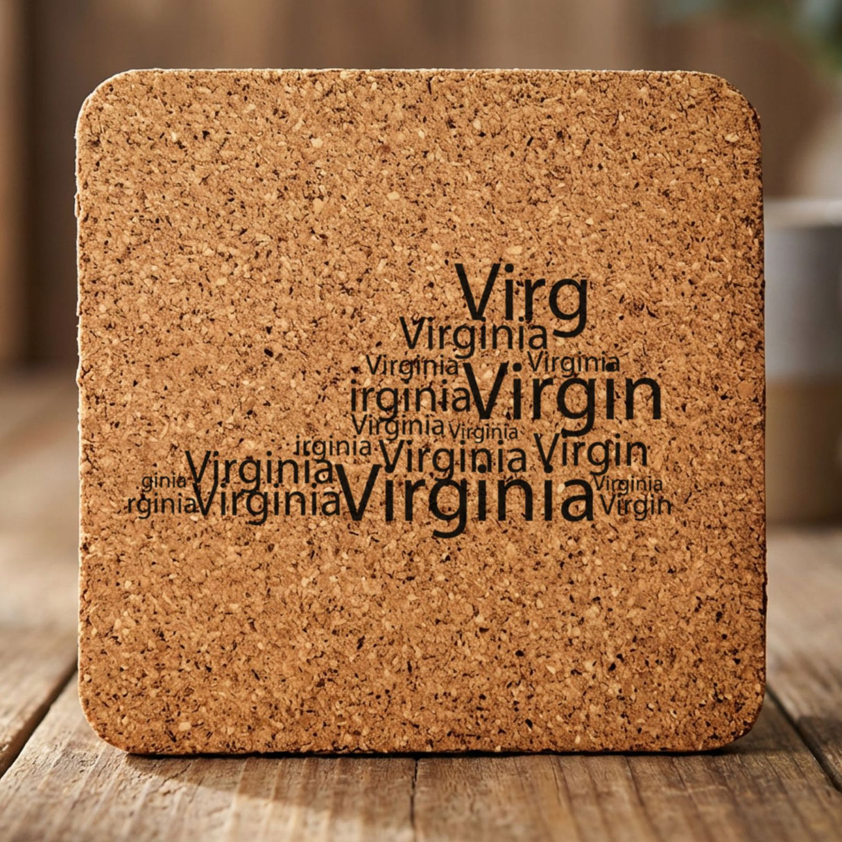 Virginia square cork coaster engraved with a word cloud of repeating Virginia text