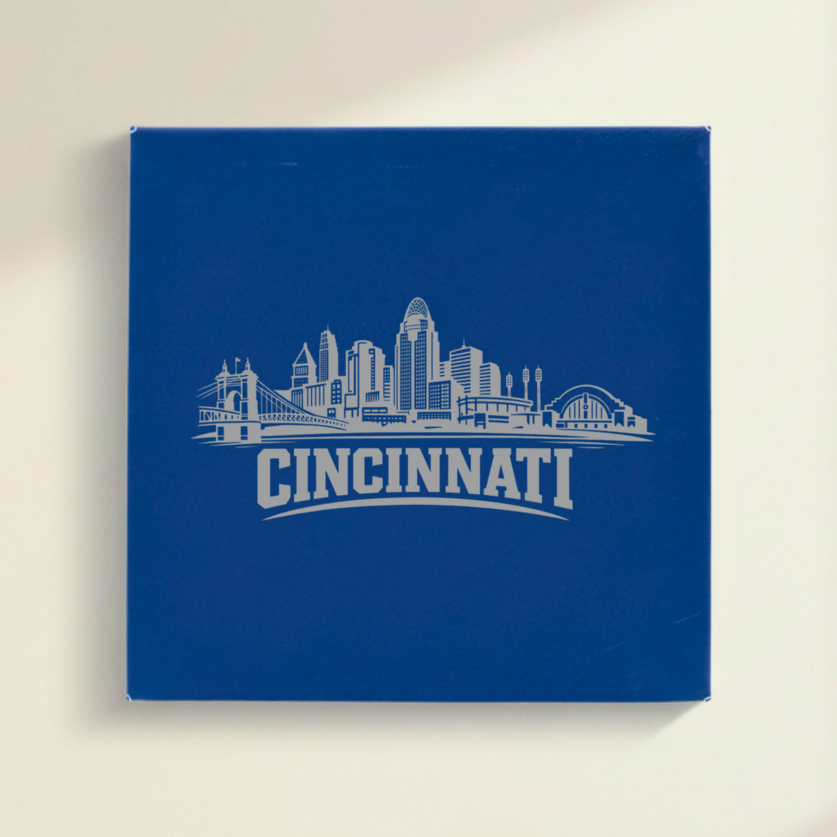 Close up of the Cincinnati, Ohio skyline engraved on Blue leatherette
