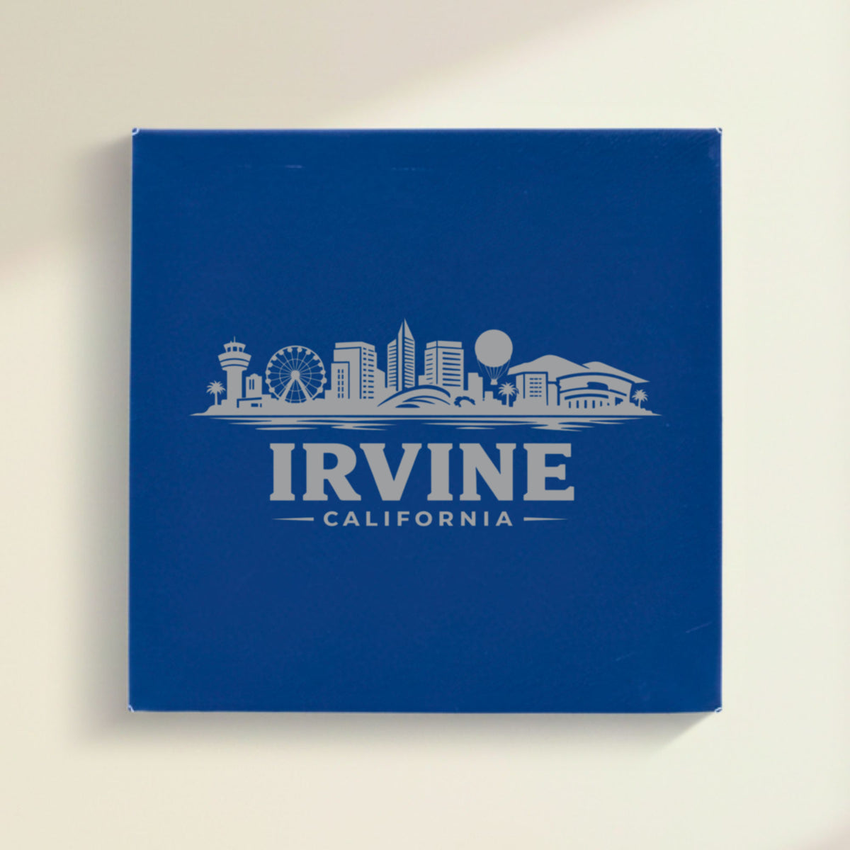 Close up of the Irvine, California skyline engraved on Blue leatherette