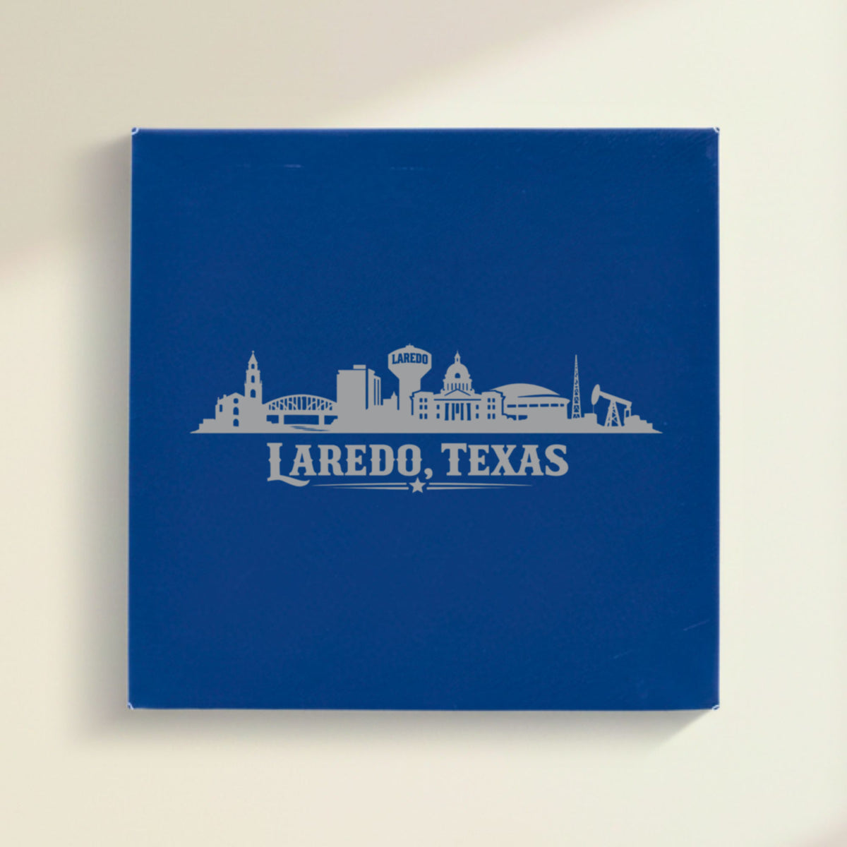 Close up of the Laredo, Texas skyline engraved on Blue leatherette