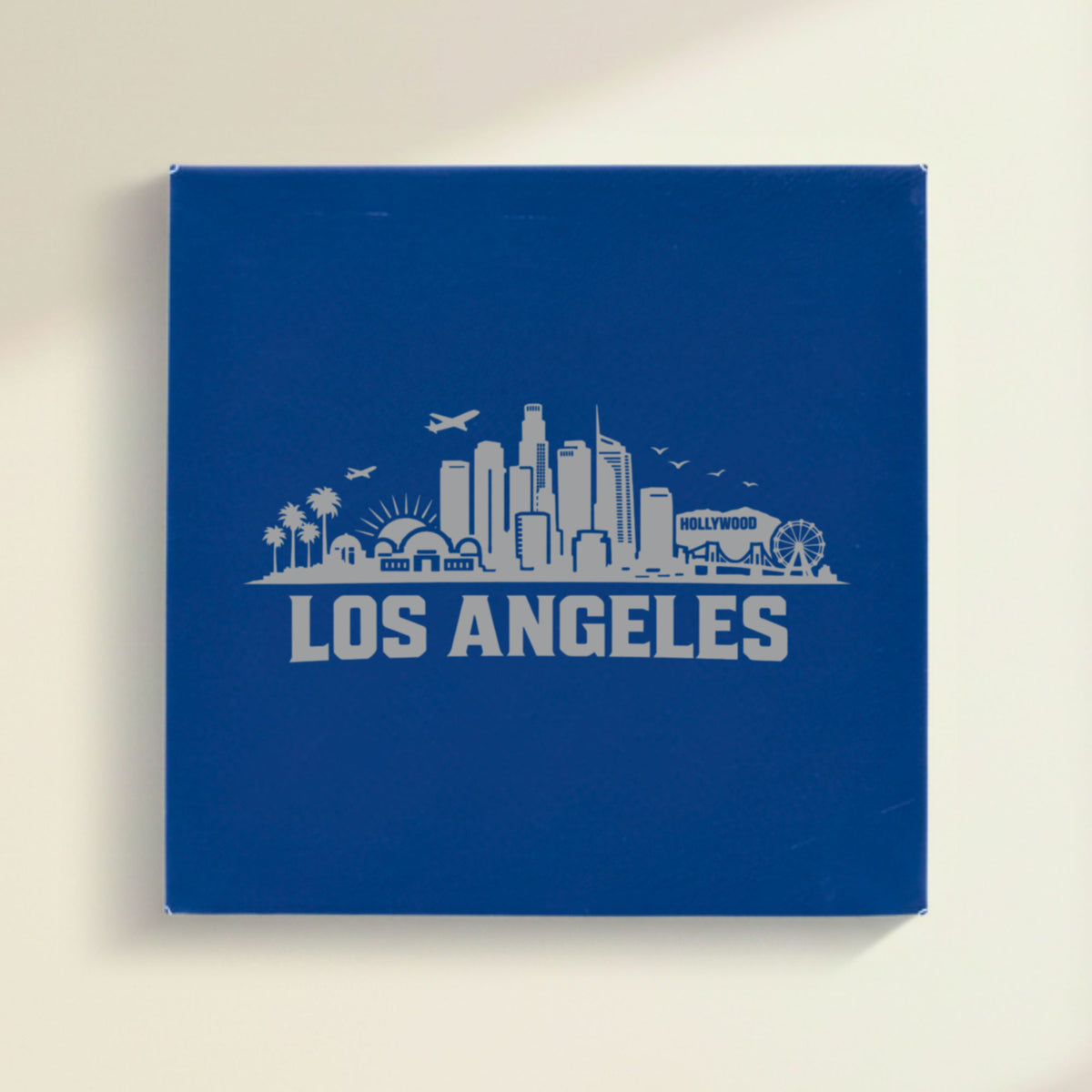Close up of the Los Angeles, California skyline engraved on Blue leatherette