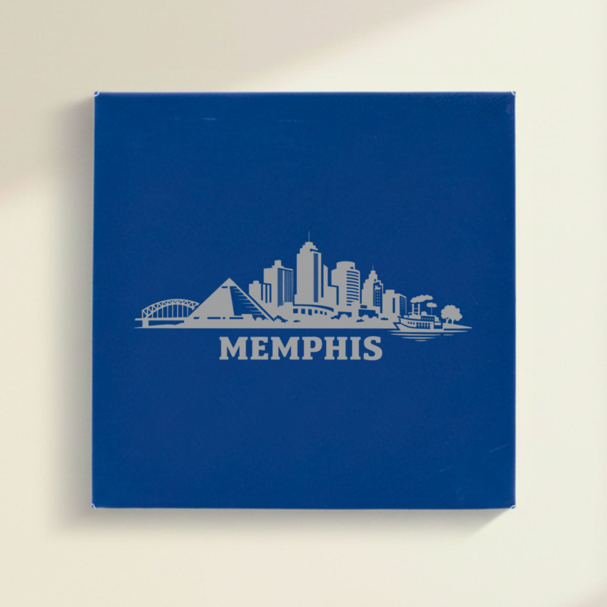 Close up of the Memphis, Tennessee skyline engraved on Blue leatherette