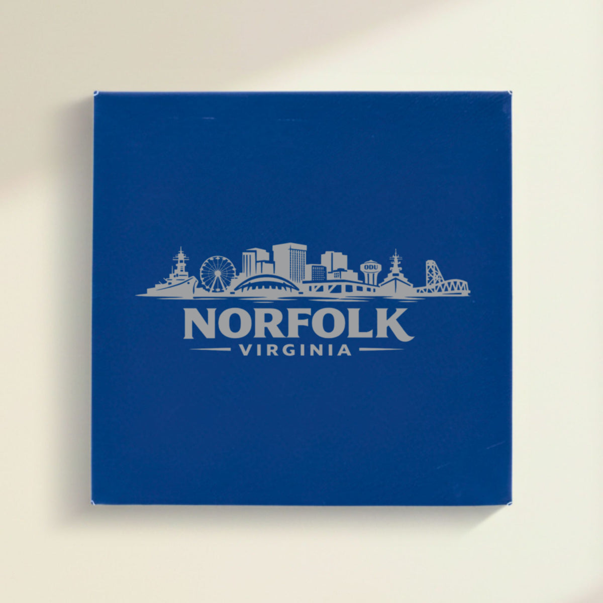 Close up of the Norfolk, Virginia skyline engraved on Blue leatherette