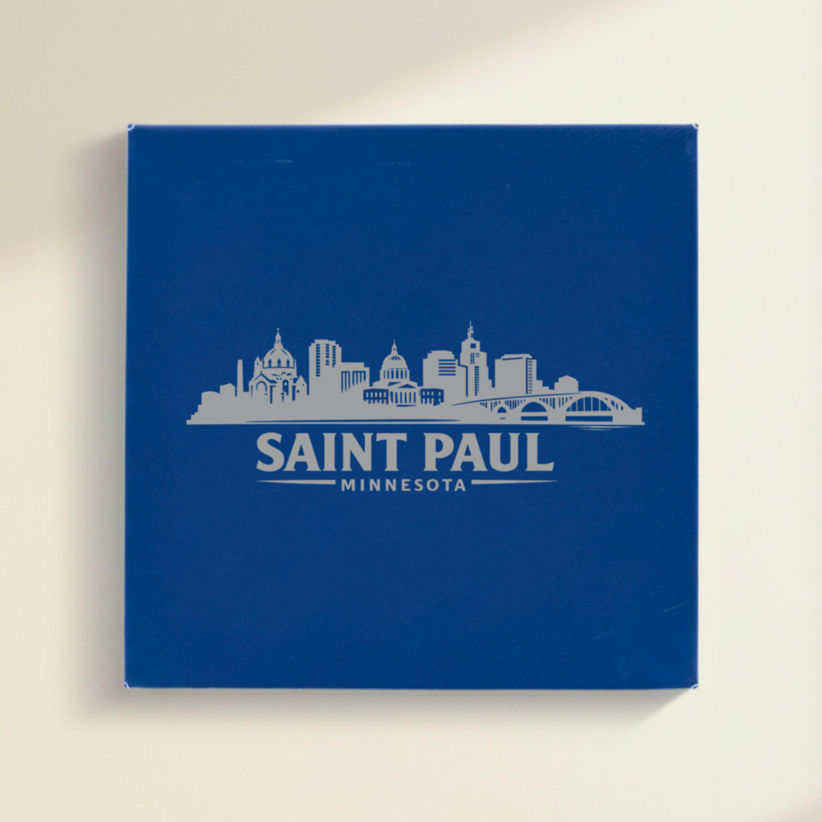 Close up of the Saint Paul, Minnesota skyline engraved on Blue leatherette