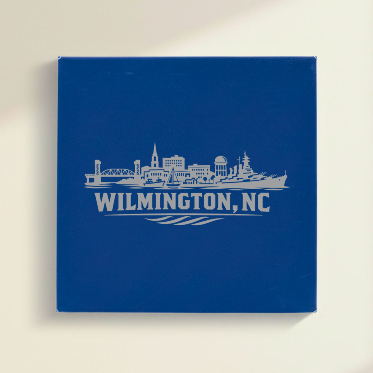 Close up of the Wilmington, North Carolina skyline engraved on Blue leatherette