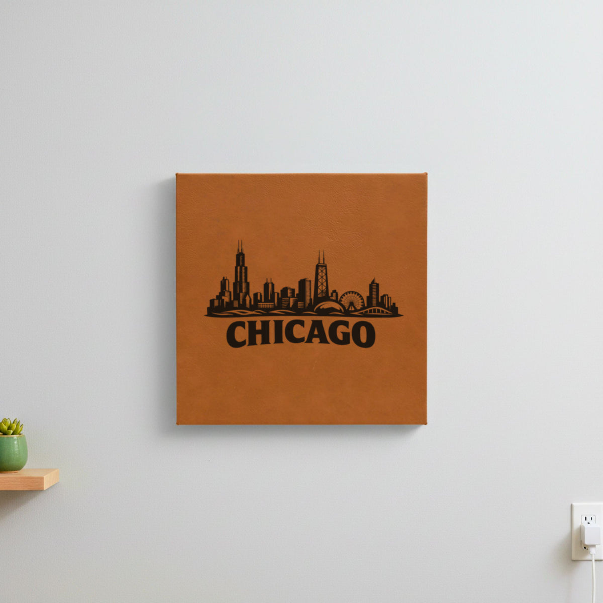 Brown leatherette wall sign engraved with the Chicago, Illinois skyline, hanging on a wall