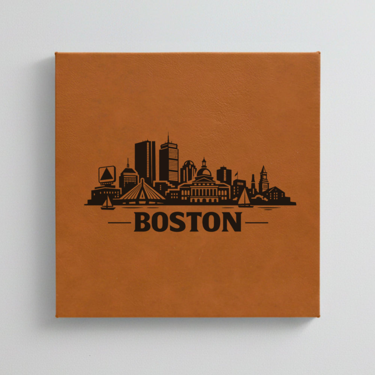Close up of the Boston, Massachusetts skyline engraved on Brown leatherette