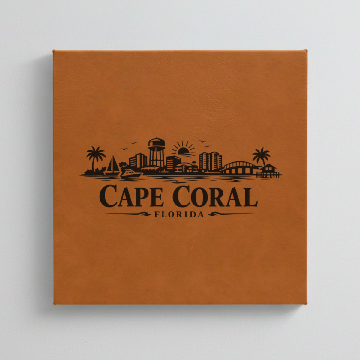 Close up of the Cape Coral, Florida skyline engraved on Brown leatherette