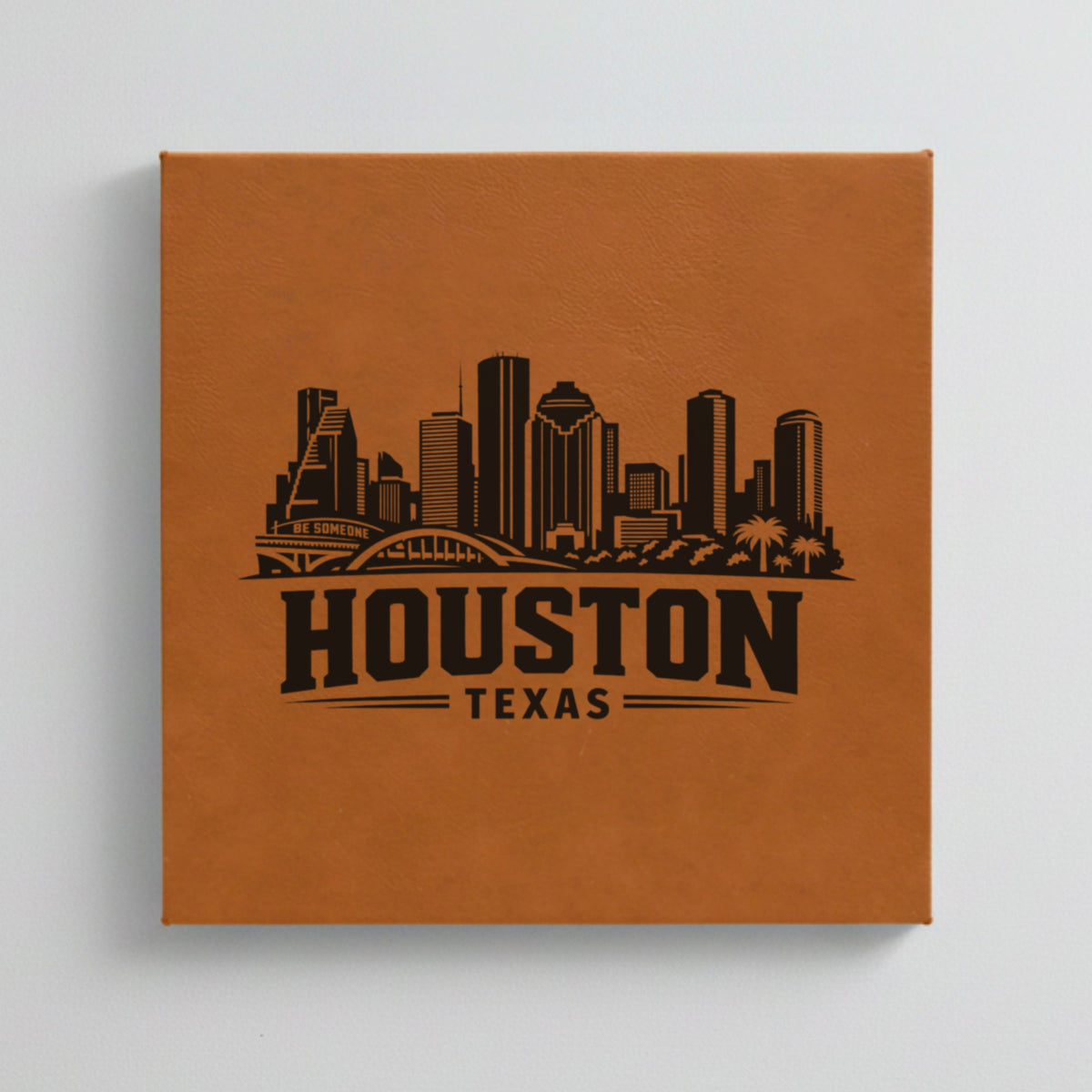 Close up of the Houston, Texas skyline engraved on Brown leatherette