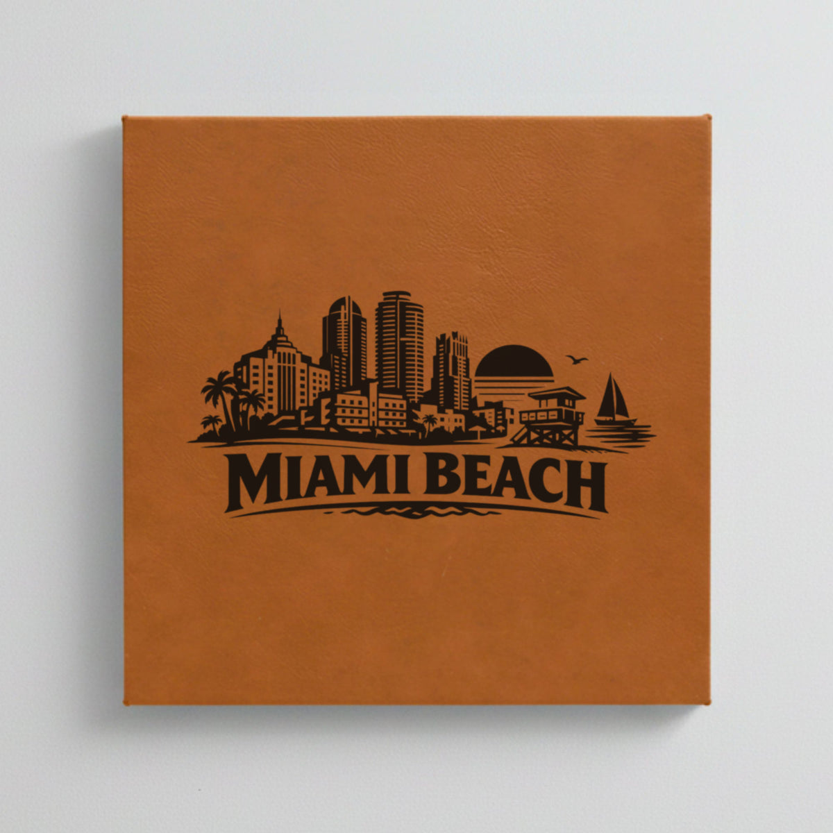 Close up of the Miami Beach, Florida skyline engraved on Brown leatherette